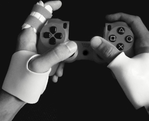 Hands holding a game controller